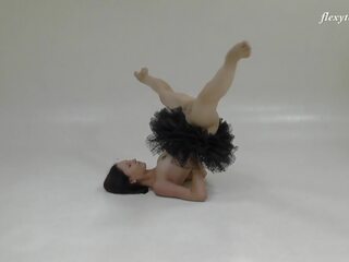 Russian brunette acrobat stretching her inviting long legs