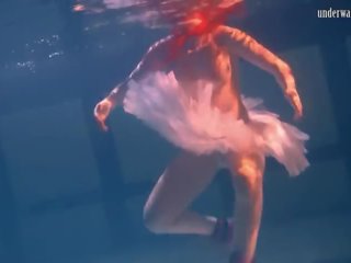 Bulava Lozhkova With a Red Tie and Skirt Underwater