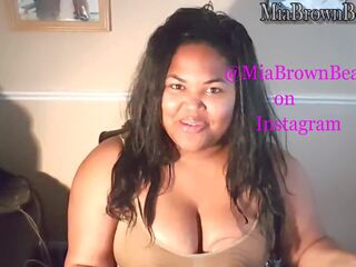 Mia pumps and fondling milk out of her big brown tits