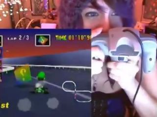 Geek mademoiselle cums playing Mario Kart