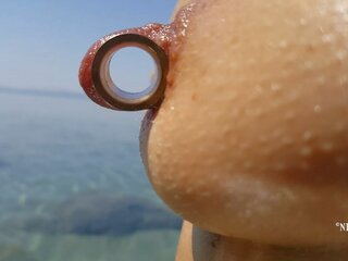 Nippleringlover - hard up MILF Pissing on the Nude Beach Pierced Pussy Wide open Huge Pierced Nipples | xHamster