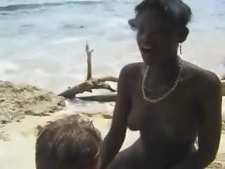 Hairy African young woman fuck Euro adolescent in the Beach