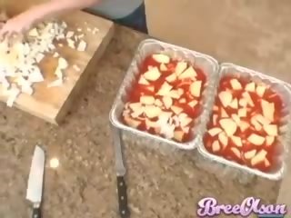 Attractive teen Bree Olson baking in her kitchen